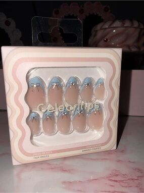 Celebritips Baby Blue French Tips with Bow Accent Press On Nails